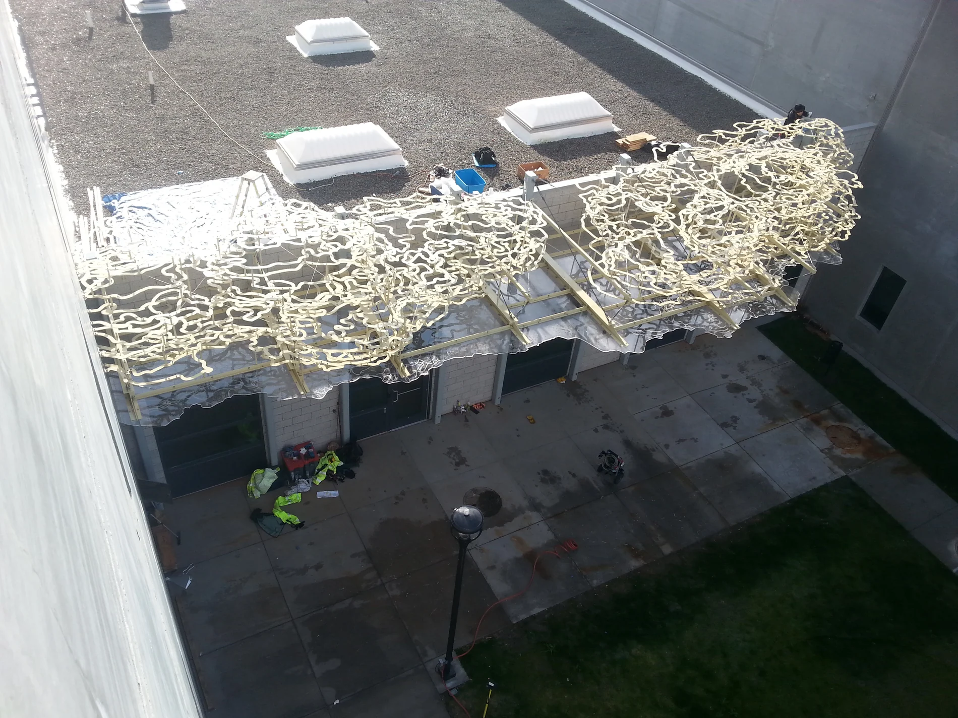 Large Passing Storms cloud assembly being positioned on site