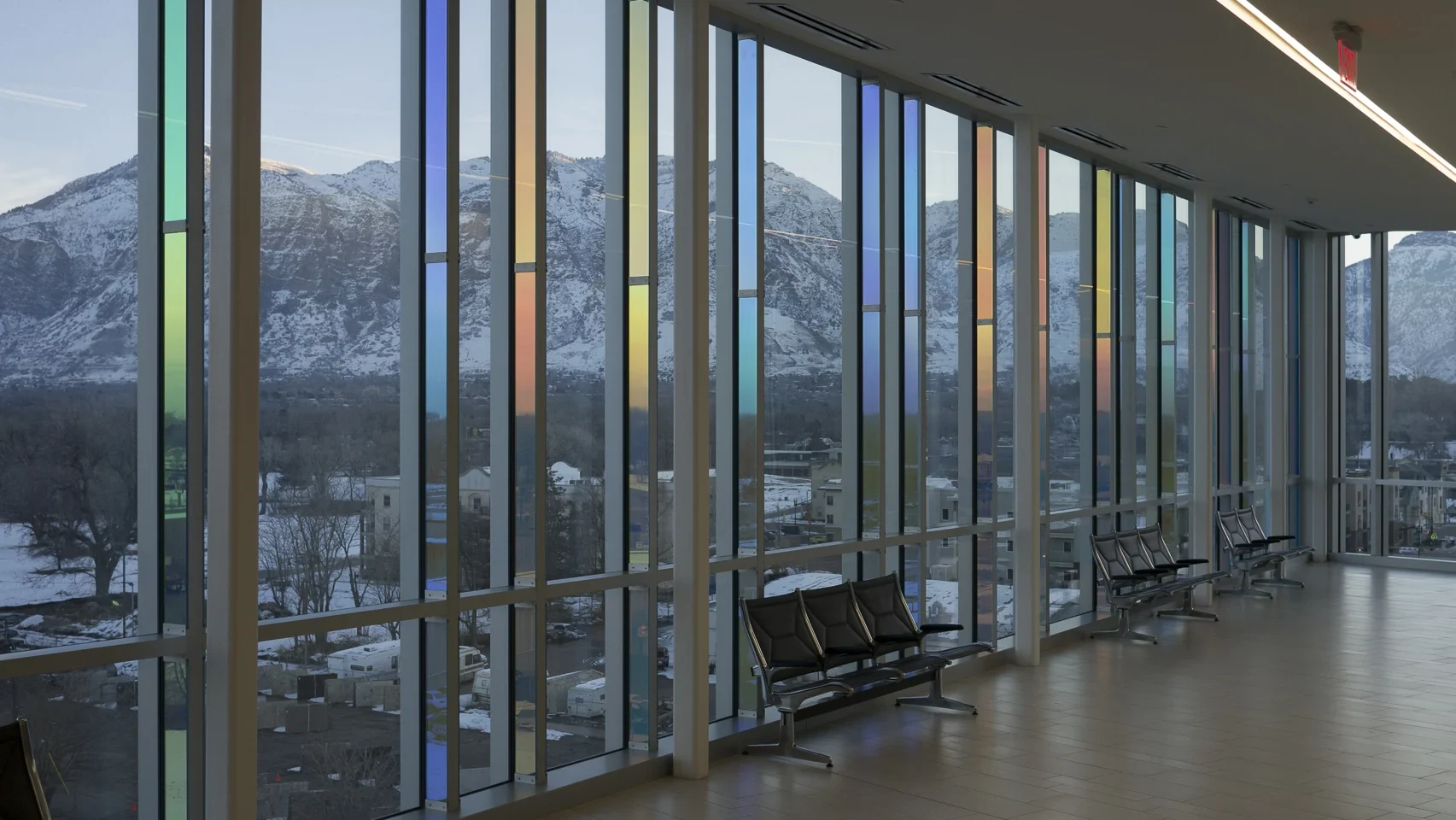 Interior view of Sky Veil with colored dichroic glass along the courthouse facade