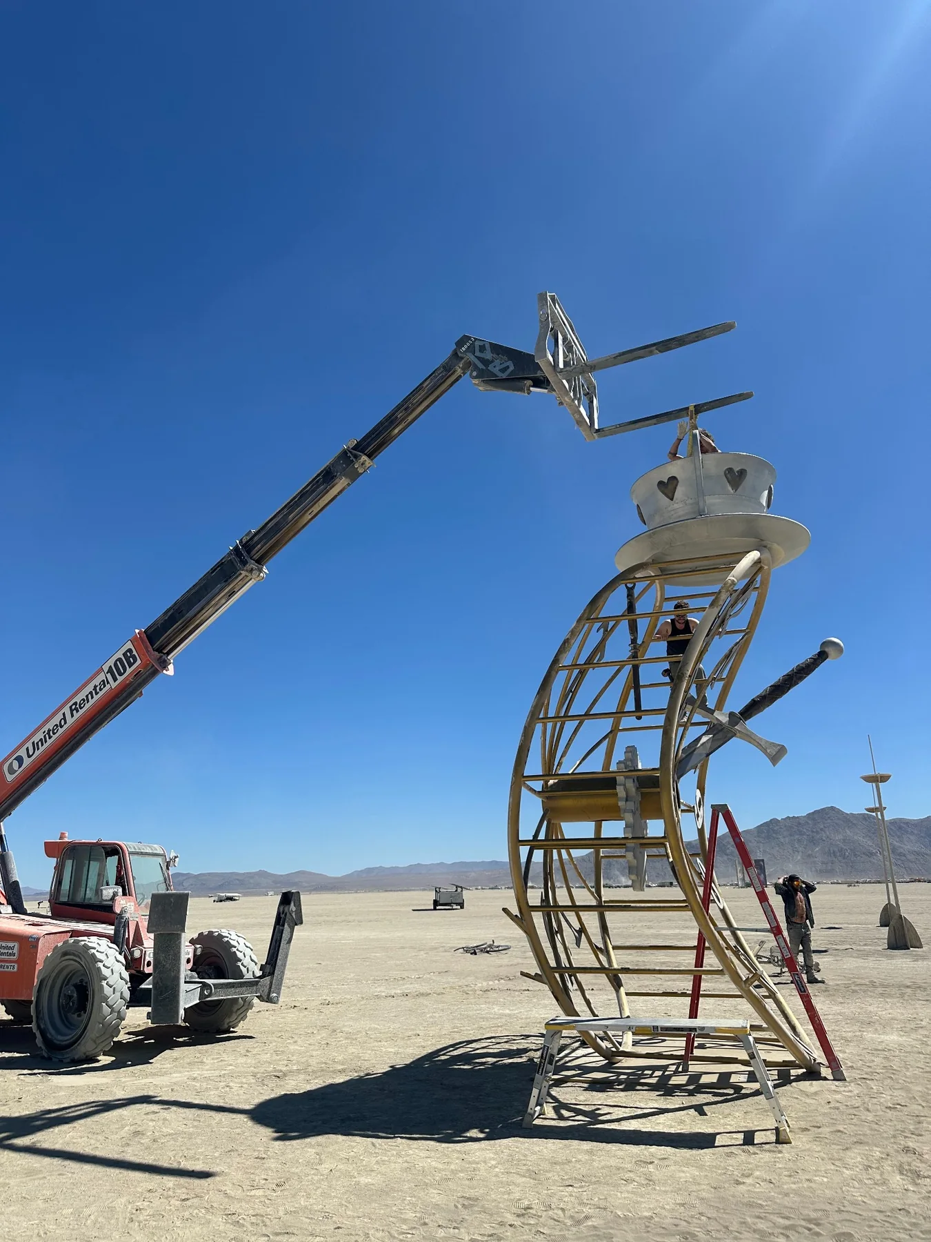 Crane-assisted installation of The End of Time at Black Rock City